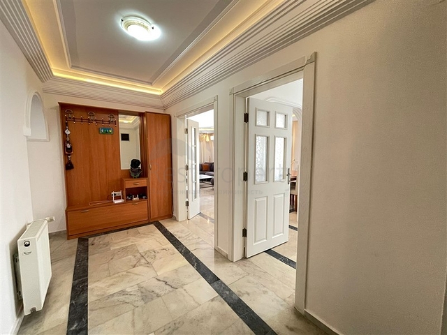 Трехкомнатная квартира на первой линии в районе Махмутлар