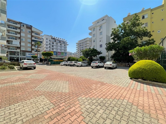 Трехкомнатная квартира на первой линии в районе Махмутлар