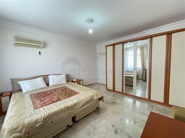 Трехкомнатная квартира на первой линии в районе Махмутлар