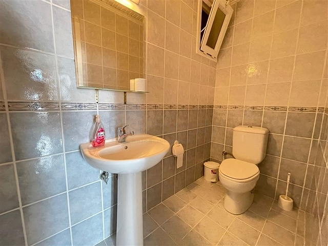 Трехкомнатная квартира на первой линии в районе Махмутлар