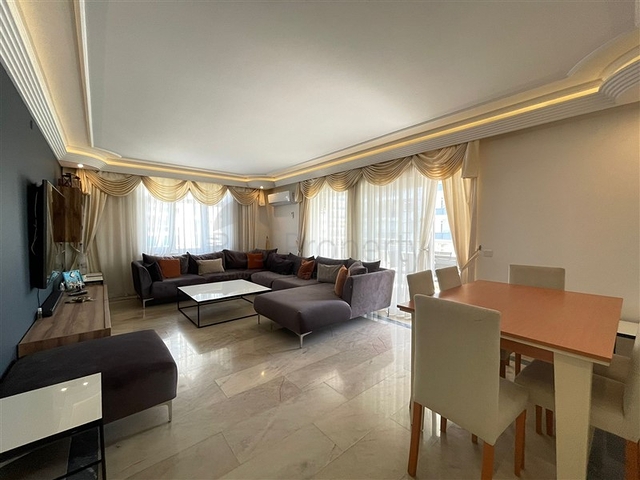 Трехкомнатная квартира на первой линии в районе Махмутлар