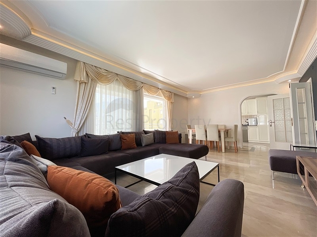 Трехкомнатная квартира на первой линии в районе Махмутлар