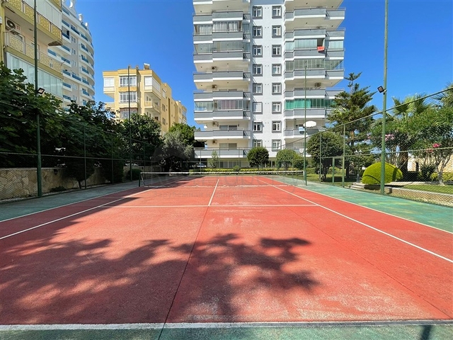 Трехкомнатная квартира на первой линии в районе Махмутлар