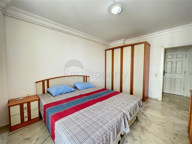 Трехкомнатная квартира на первой линии в районе Махмутлар