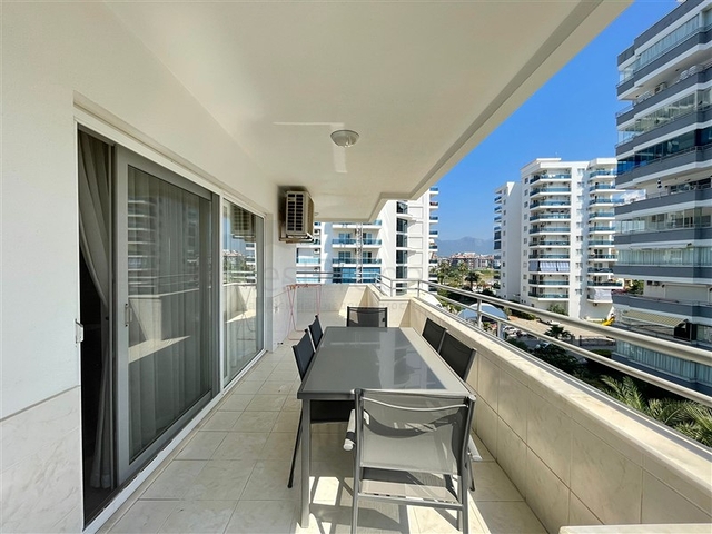 Трехкомнатная квартира на первой линии в районе Махмутлар