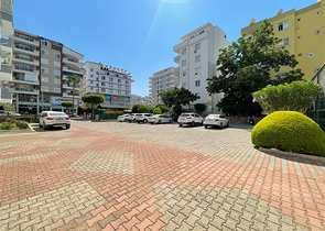 Трехкомнатная квартира на первой линии в районе Махмутлар