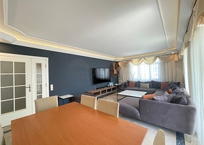 Трехкомнатная квартира на первой линии в районе Махмутлар