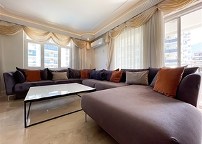 Трехкомнатная квартира на первой линии в районе Махмутлар