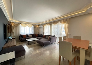 Трехкомнатная квартира на первой линии в районе Махмутлар