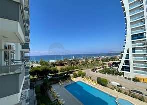 Трехкомнатная квартира на первой линии в районе Махмутлар