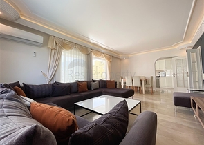 Трехкомнатная квартира на первой линии в районе Махмутлар