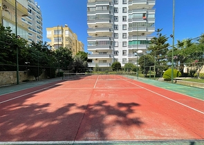 Трехкомнатная квартира на первой линии в районе Махмутлар