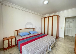 Трехкомнатная квартира на первой линии в районе Махмутлар