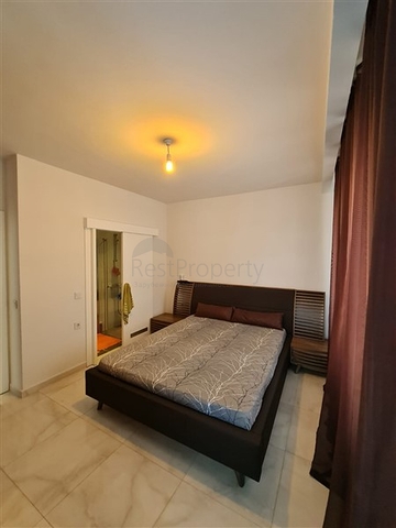 Квартира планировкой 2+1 в районе Махмутлар