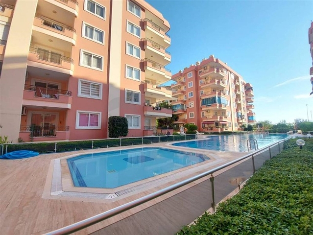 Квартира 2+1 в районе Махмутлар в 50 м от моря