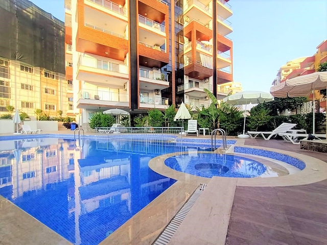 Квартира планировкой 2+1 в районе Махмутлар