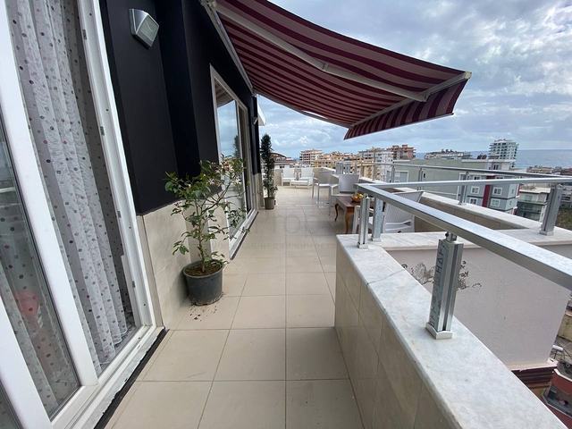 Квартира планировкой 2+1 в районе Махмутлар