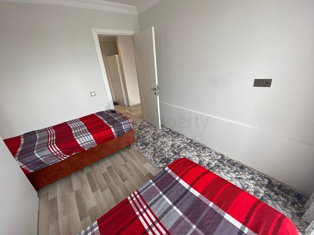 Квартира планировкой 2+1 в районе Махмутлар