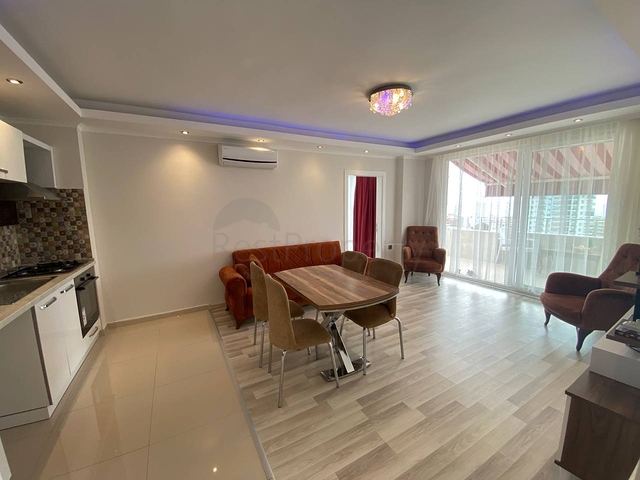 Квартира планировкой 2+1 в районе Махмутлар