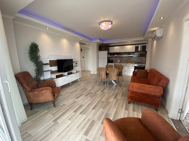 Квартира планировкой 2+1 в районе Махмутлар