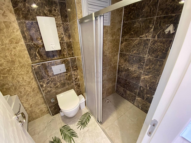 Квартира планировкой 2+1 в районе Махмутлар