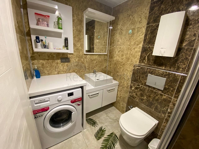 Квартира планировкой 2+1 в районе Махмутлар