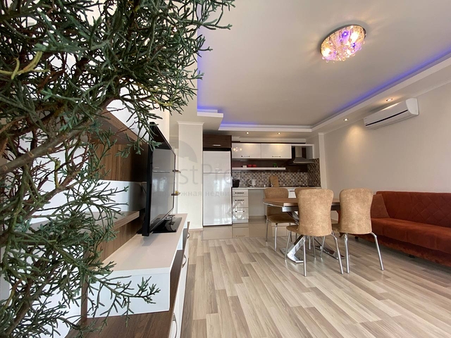 Квартира планировкой 2+1 в районе Махмутлар