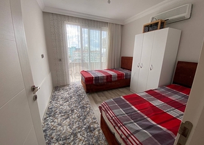 Квартира планировкой 2+1 в районе Махмутлар