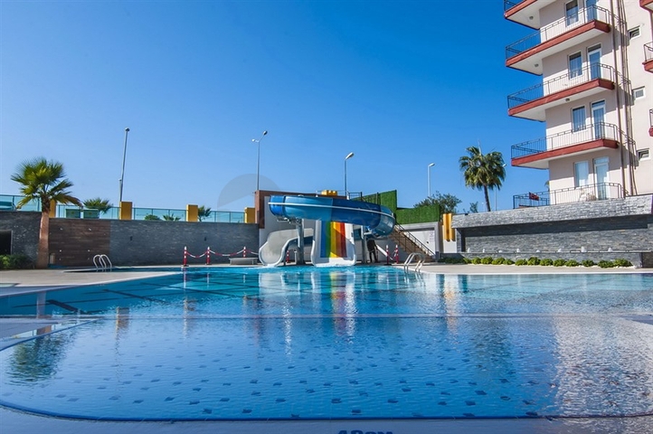 Квартира 2+1 на первой береговой линии в Махмутларе