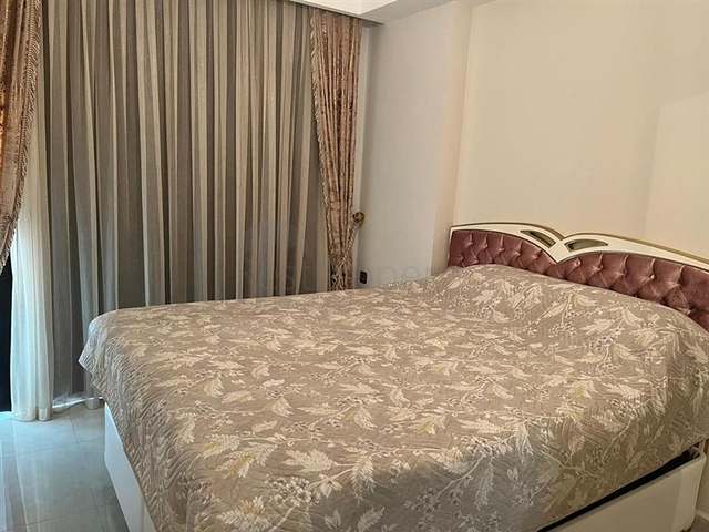 Квартира 2+1 на первой береговой линии в Махмутларе