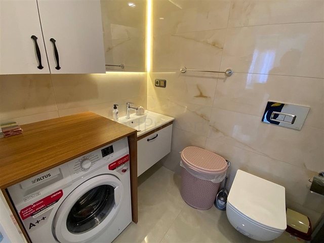 Квартира 2+1 на первой береговой линии в Махмутларе