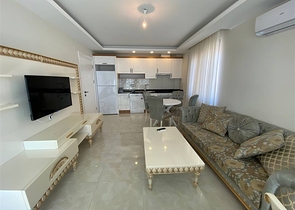 Квартира 2+1 на первой береговой линии в Махмутларе