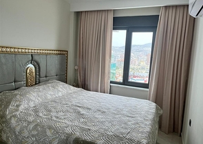 Квартира 2+1 на первой береговой линии в Махмутларе