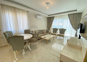 Квартира 2+1 на первой береговой линии в Махмутларе