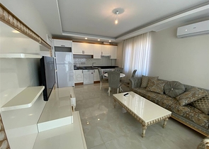 Квартира 2+1 на первой береговой линии в Махмутларе