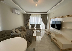 Квартира 2+1 на первой береговой линии в Махмутларе