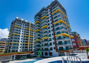 Квартира 2+1 на первой береговой линии в Махмутларе