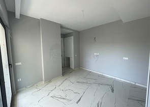 Новые апартаменты 1+1 в центре Алании