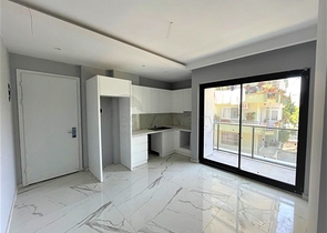 Новые апартаменты 1+1 в центре Алании