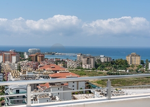 Пентхаус 4+1 с видом на море в люксовом комплексе в районе Авсаллар