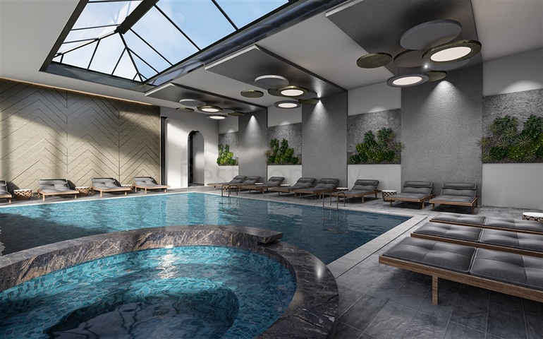 Двухкомнатная квартира с панорамным видом на горы в районе Махмутлар