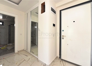 Двухкомнатная квартира с панорамным видом на горы в районе Махмутлар