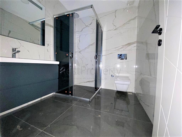 Трехкомнатная квартира в районе Тосмур