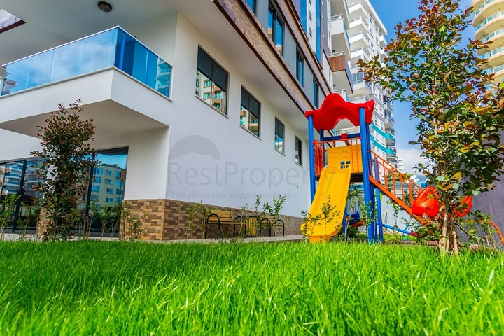 Квартира планировки 2+1 в районе Махмутлар