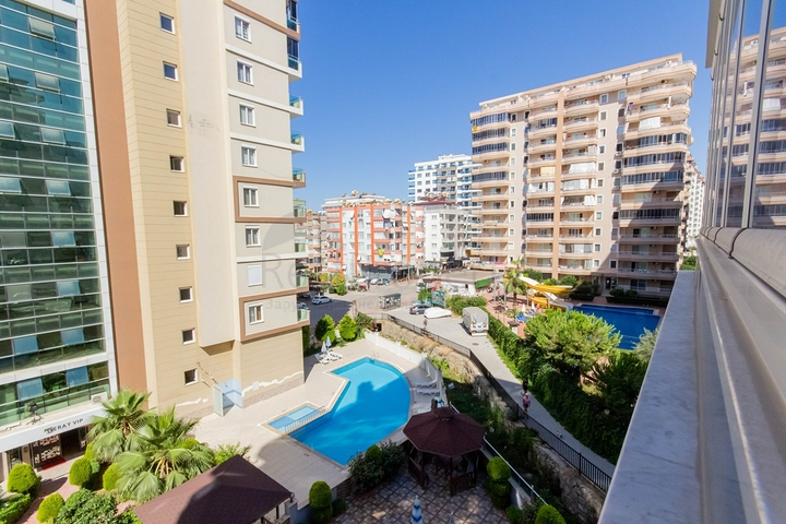 Квартира планировки 2+1 в районе Махмутлар