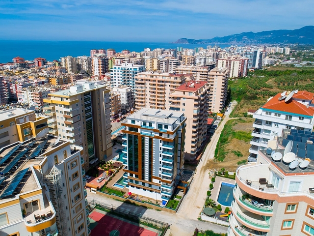 Квартира планировки 2+1 в районе Махмутлар