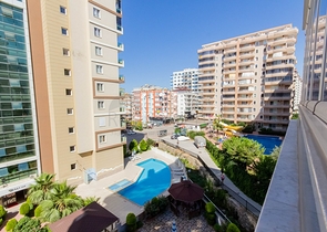 Квартира планировки 2+1 в районе Махмутлар