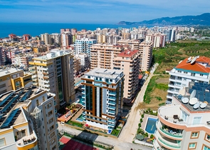 Квартира планировки 2+1 в районе Махмутлар