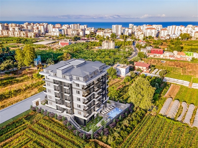 Квартира 1+1 в строящемся комплексе в Махмутларе