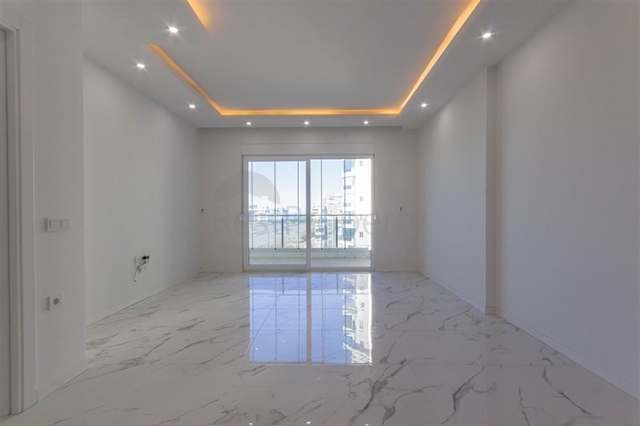 Большая квартира 1+1 в районе Махмутлар 